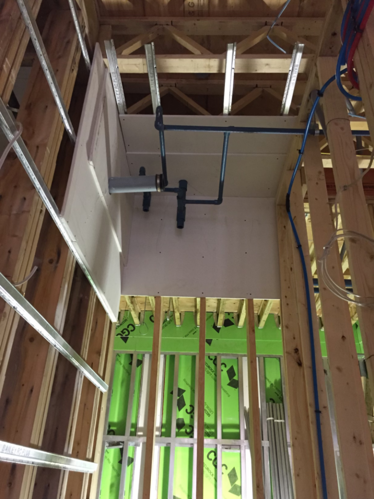 Dry wall on wooden beams still exposed